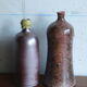 2 bouteilles en céramique vintage