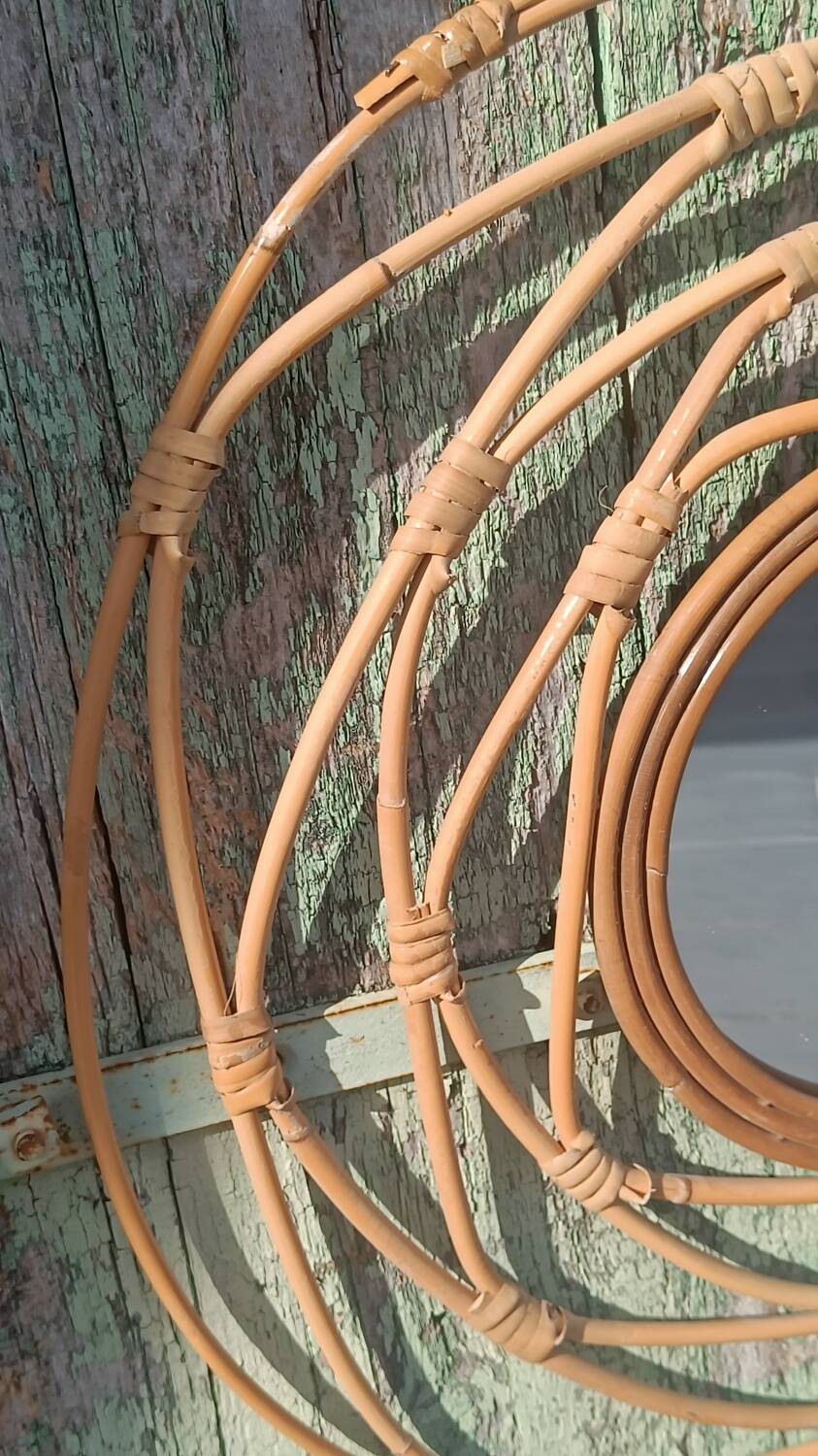 Round rattan mirror
