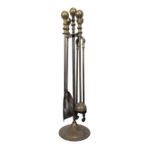 Brass fireplace tool set with four accessories