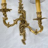 2 brass wall lights with toile de jouy lampshades