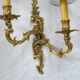 2 brass wall lights with toile de jouy lampshades