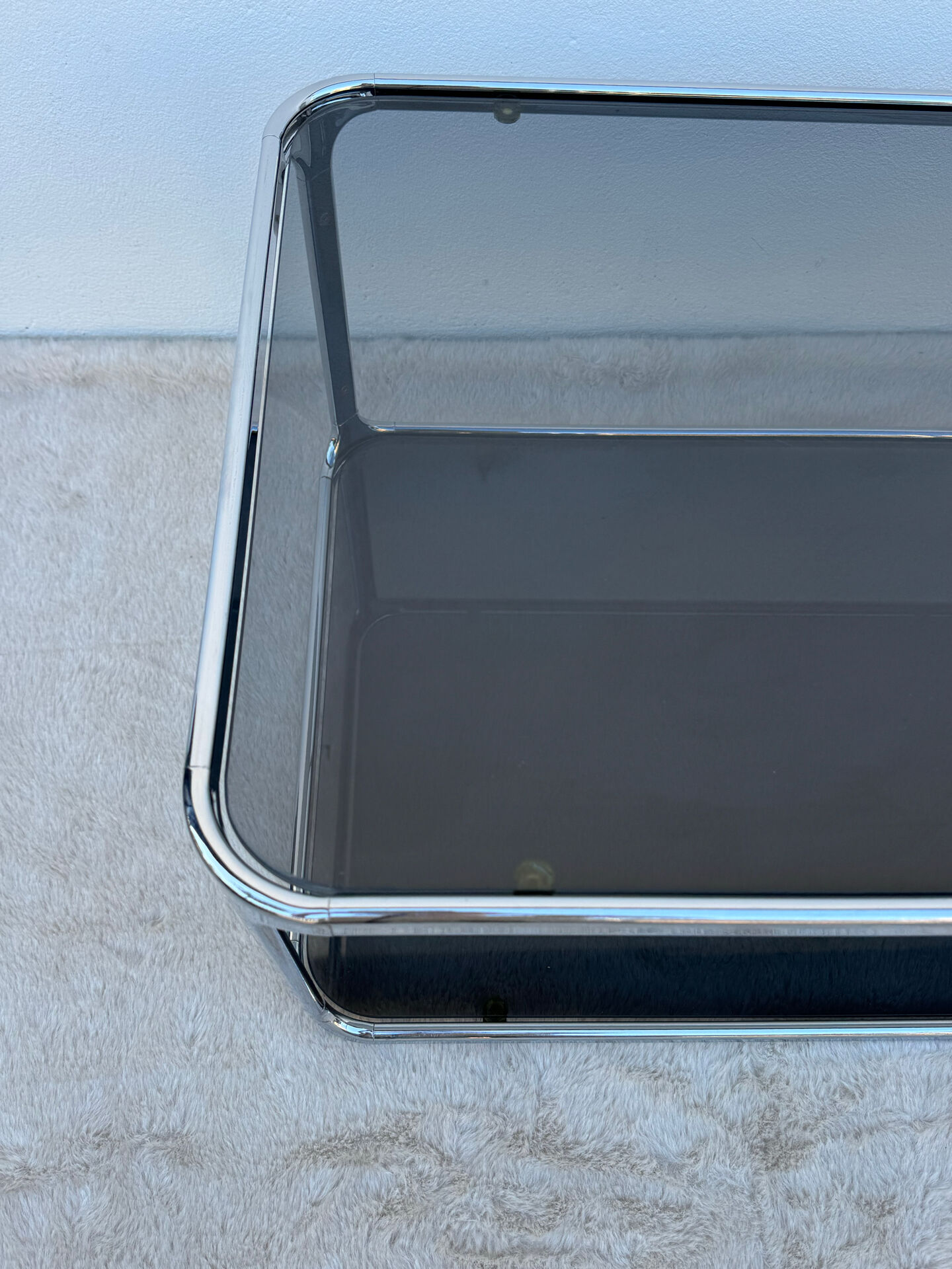 Chrome and smoked glass coffee table from the 1970s.