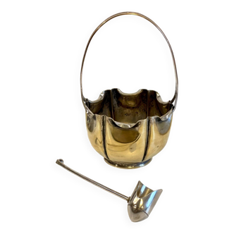 silver metal sugar bowl with gold patina