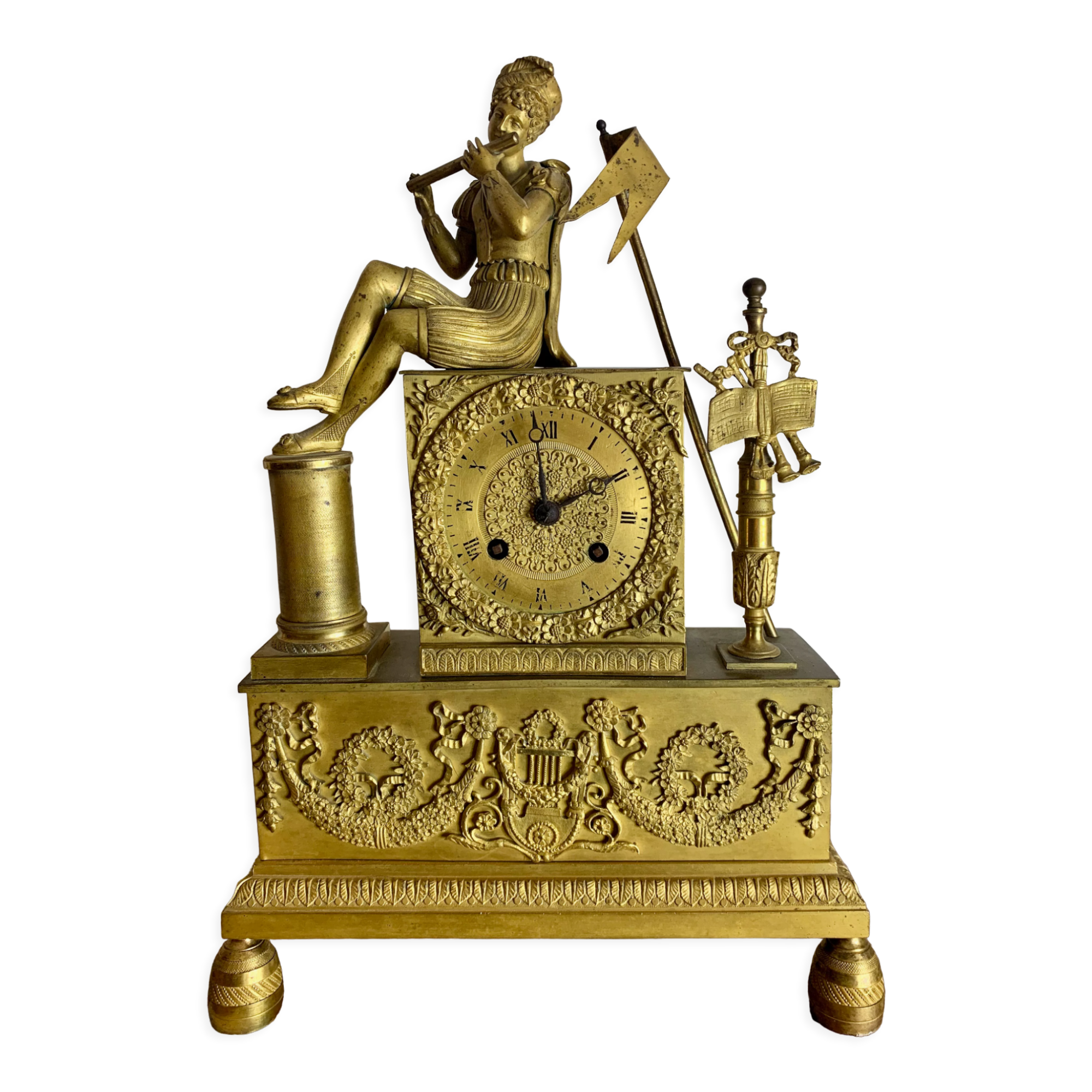 Period clock restoration in gilded bronze