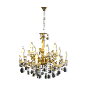 Lustre à douze bras de lumières en bronze doré