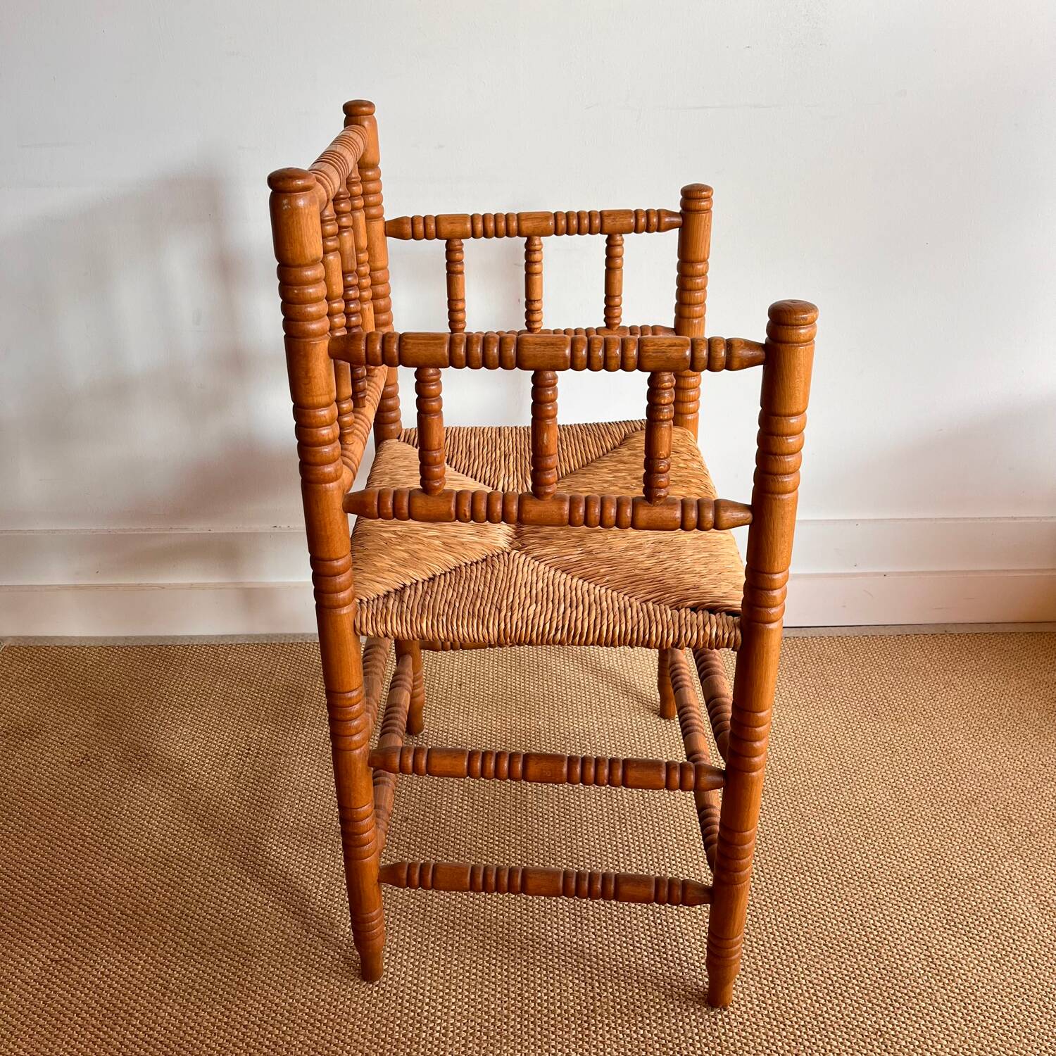 Antique Dutch bobbin chair with rush seating