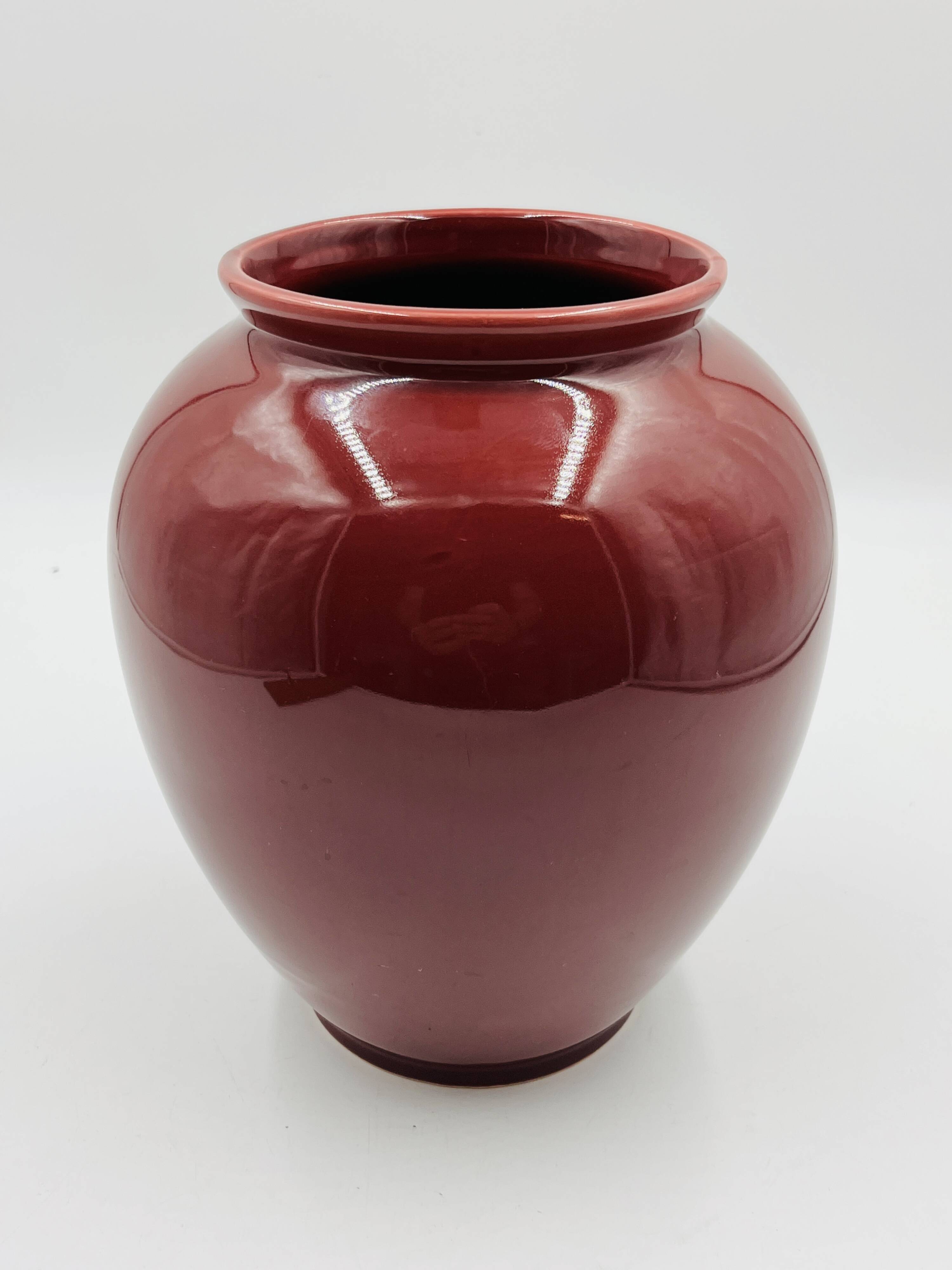 Vintage vase in glazed burgundy ceramic