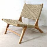 Pair of low armchairs in wood and woven rattan