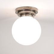 Large opaline glass globe ceiling lamp in Art Deco style.