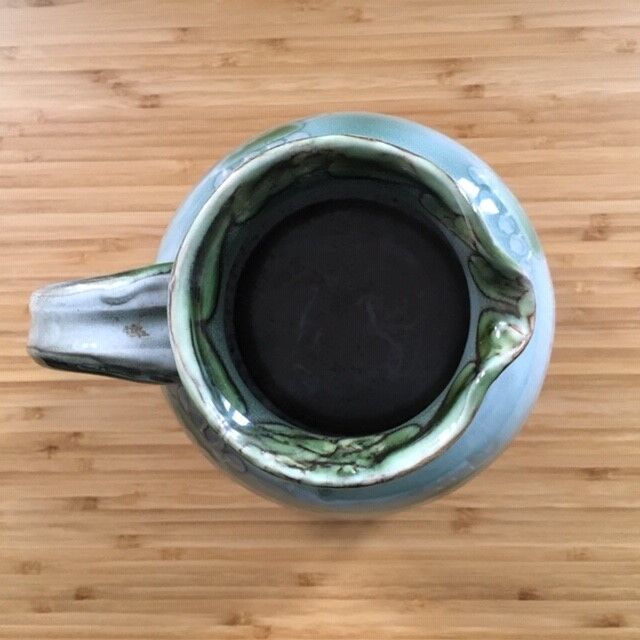 Grey-blue pitcher with floral decoration