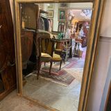 Giled and black fireplace mirror