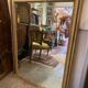 Giled and black fireplace mirror