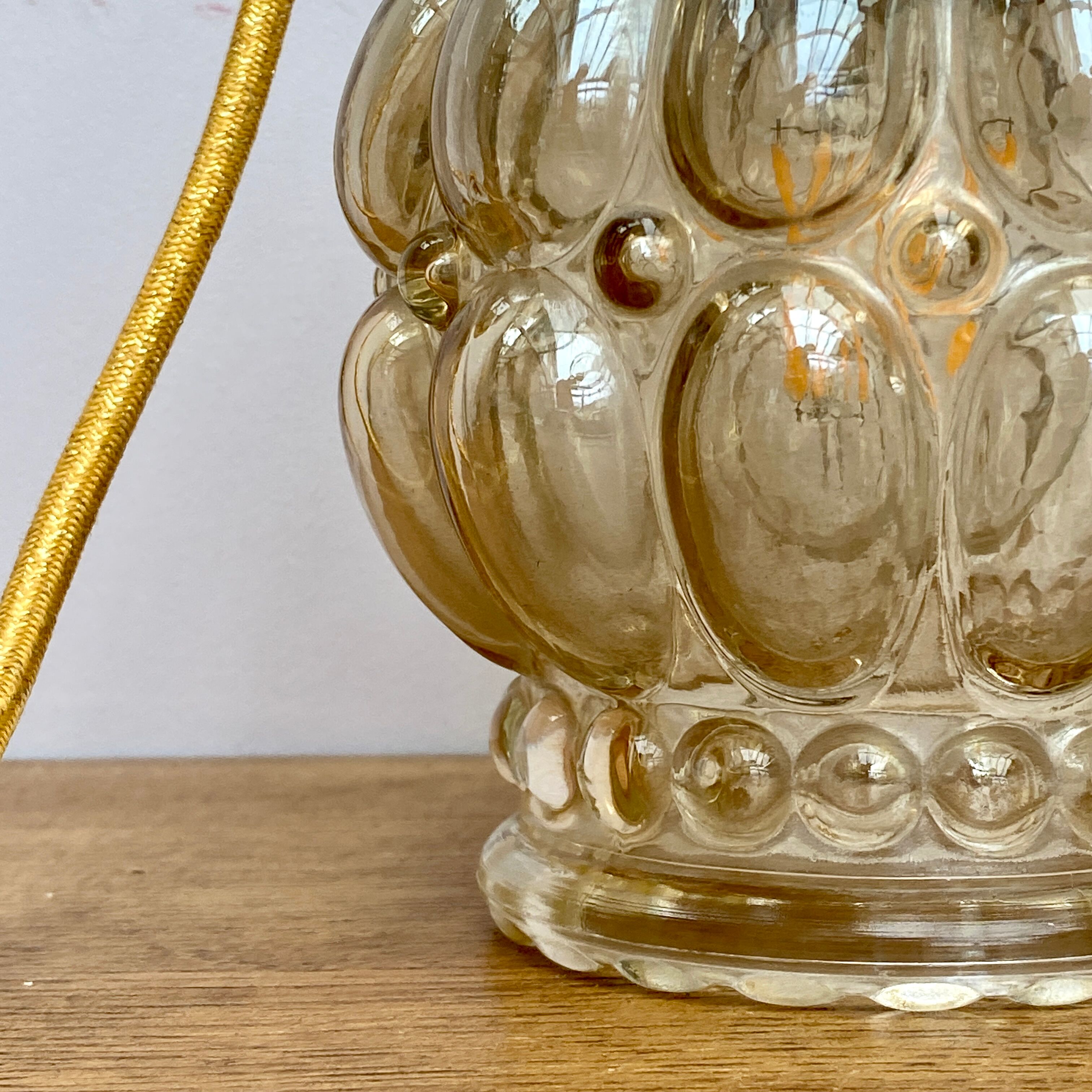 Vintage amber glass globe walker