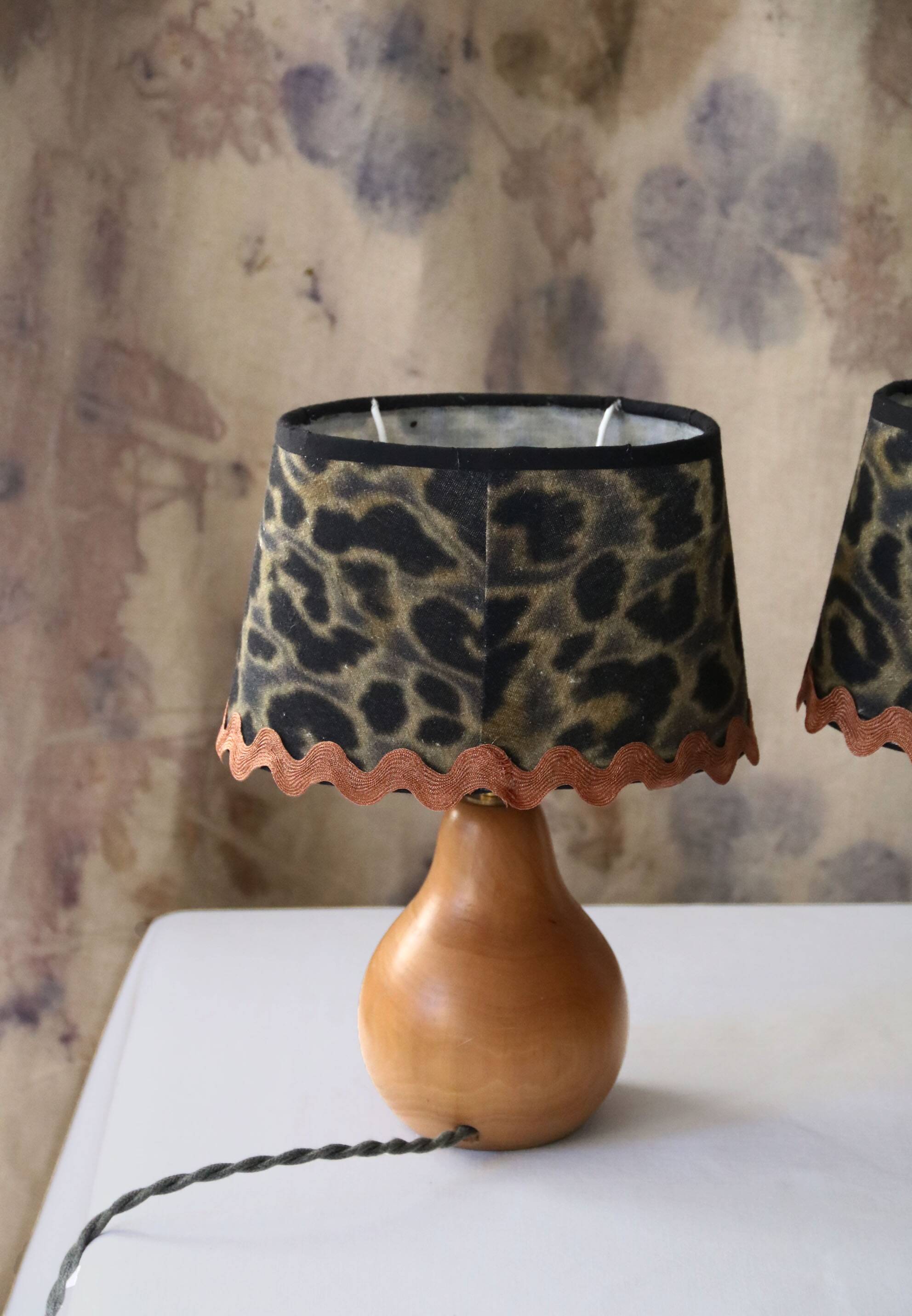 Pair of pear wood bedside lamps with leopard shades