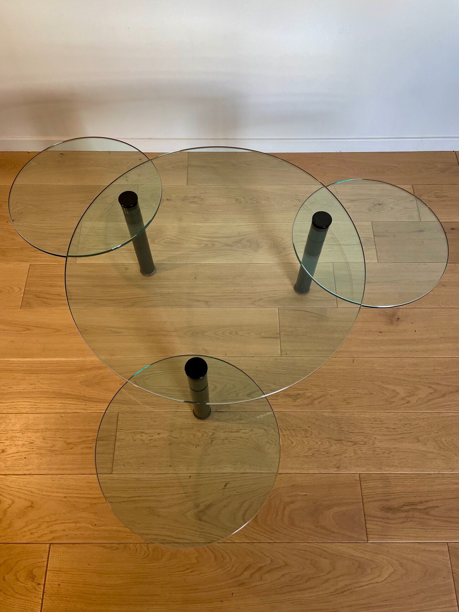 Glass coffee table and black base