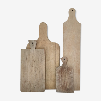 Four vintage patinated solid wood cutting boards