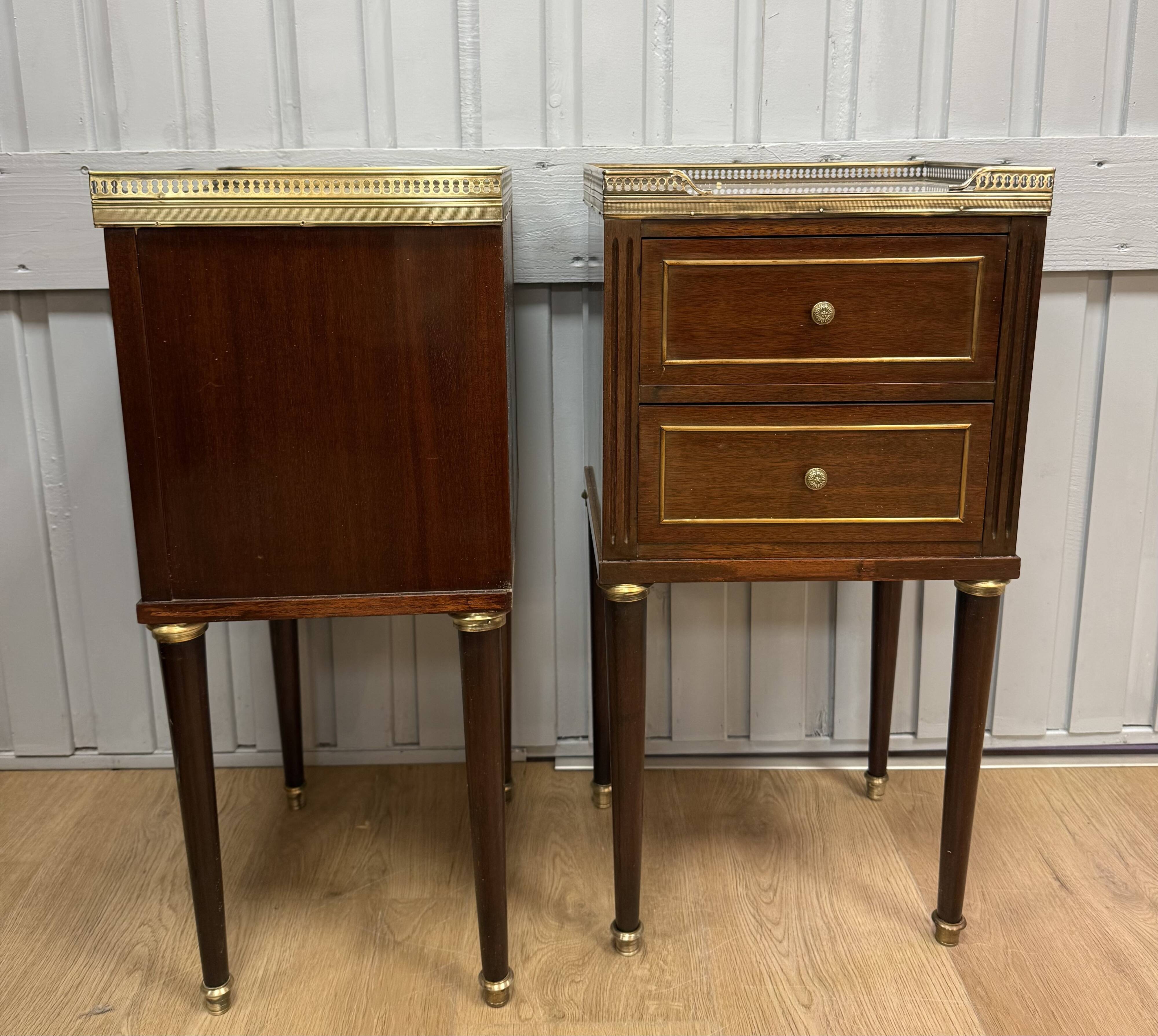 Pair of Louis XVI style bedside tables in mahogany