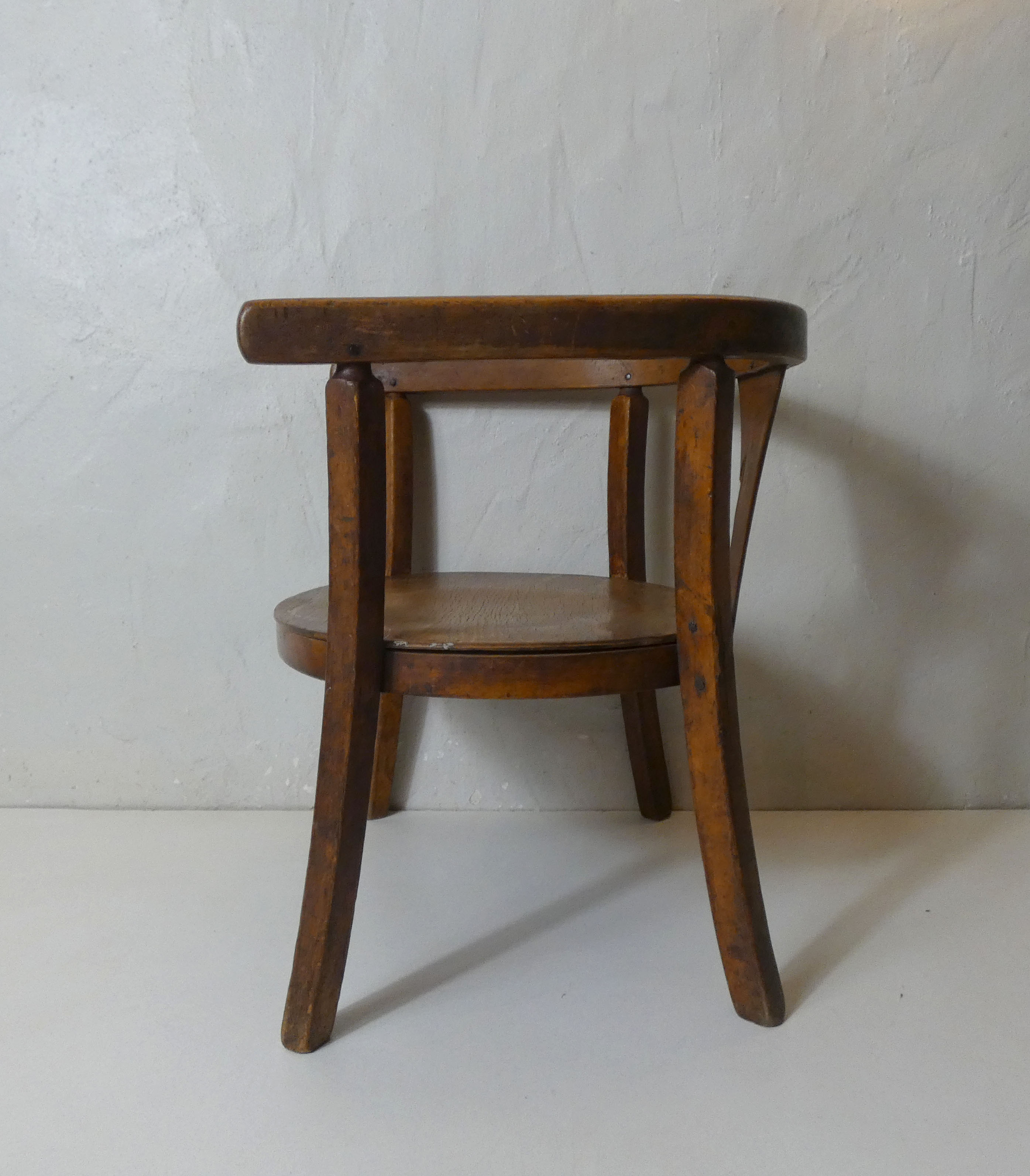 Old wooden armchair for children