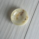 Marbled onyx pocket emptier