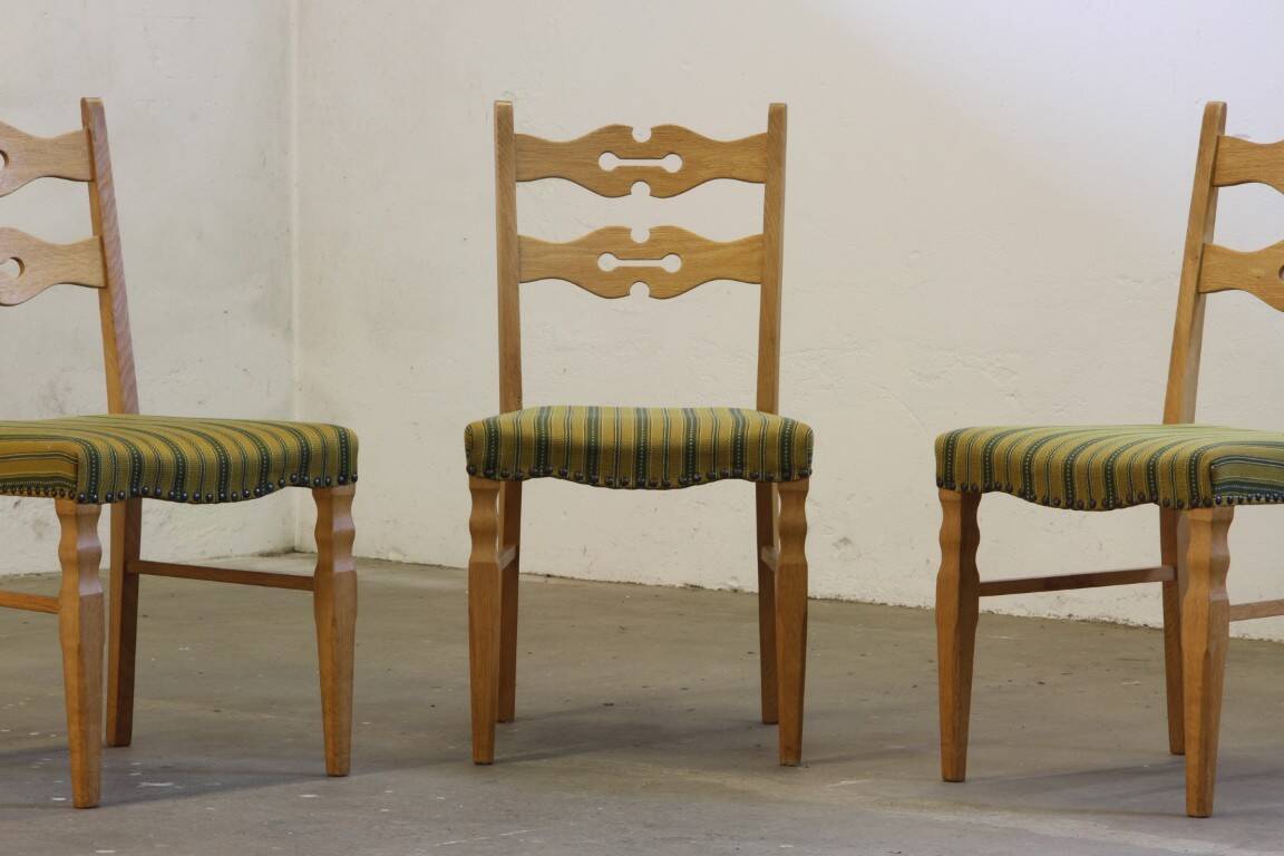 Vintage 1960s brutalist Danish modern oak dining chairs in the style of Henning Kjærnulf
