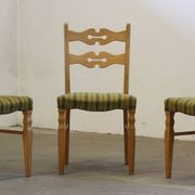 Vintage 1960s brutalist Danish modern oak dining chairs in the style of Henning Kjærnulf