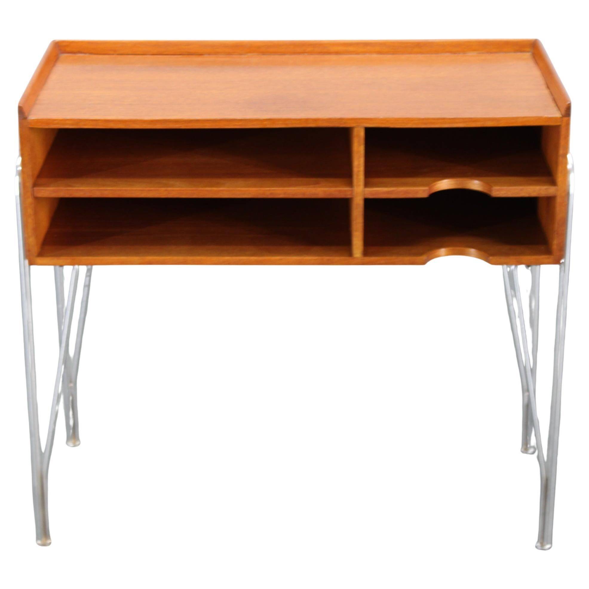 1960s Danish teak shelf cabinet with chrome plated legs