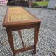 Beechwood piano bench with caning on the seat
