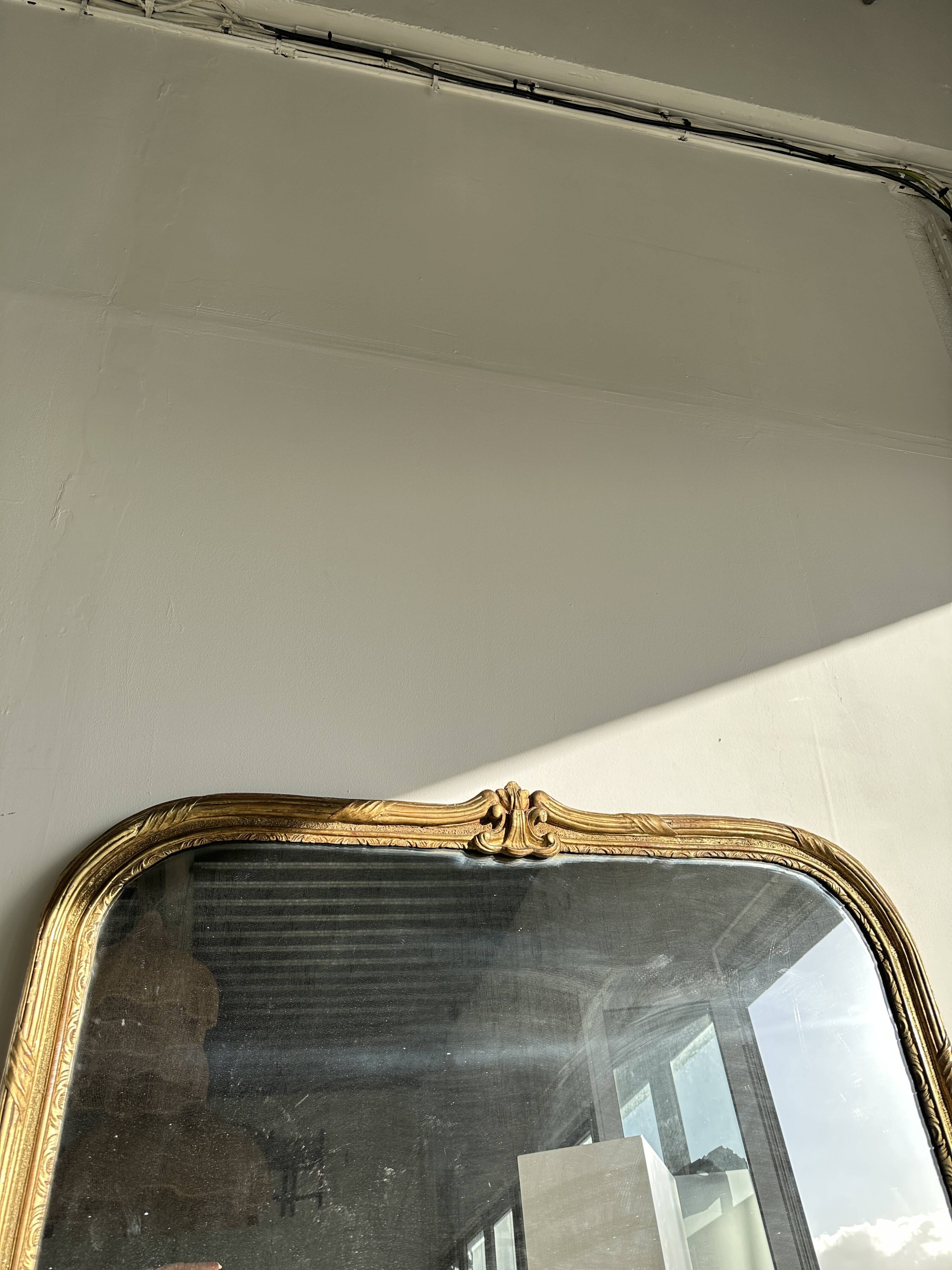Large gilded mirror 19th century rounded corners mercury glass Louis XVI style