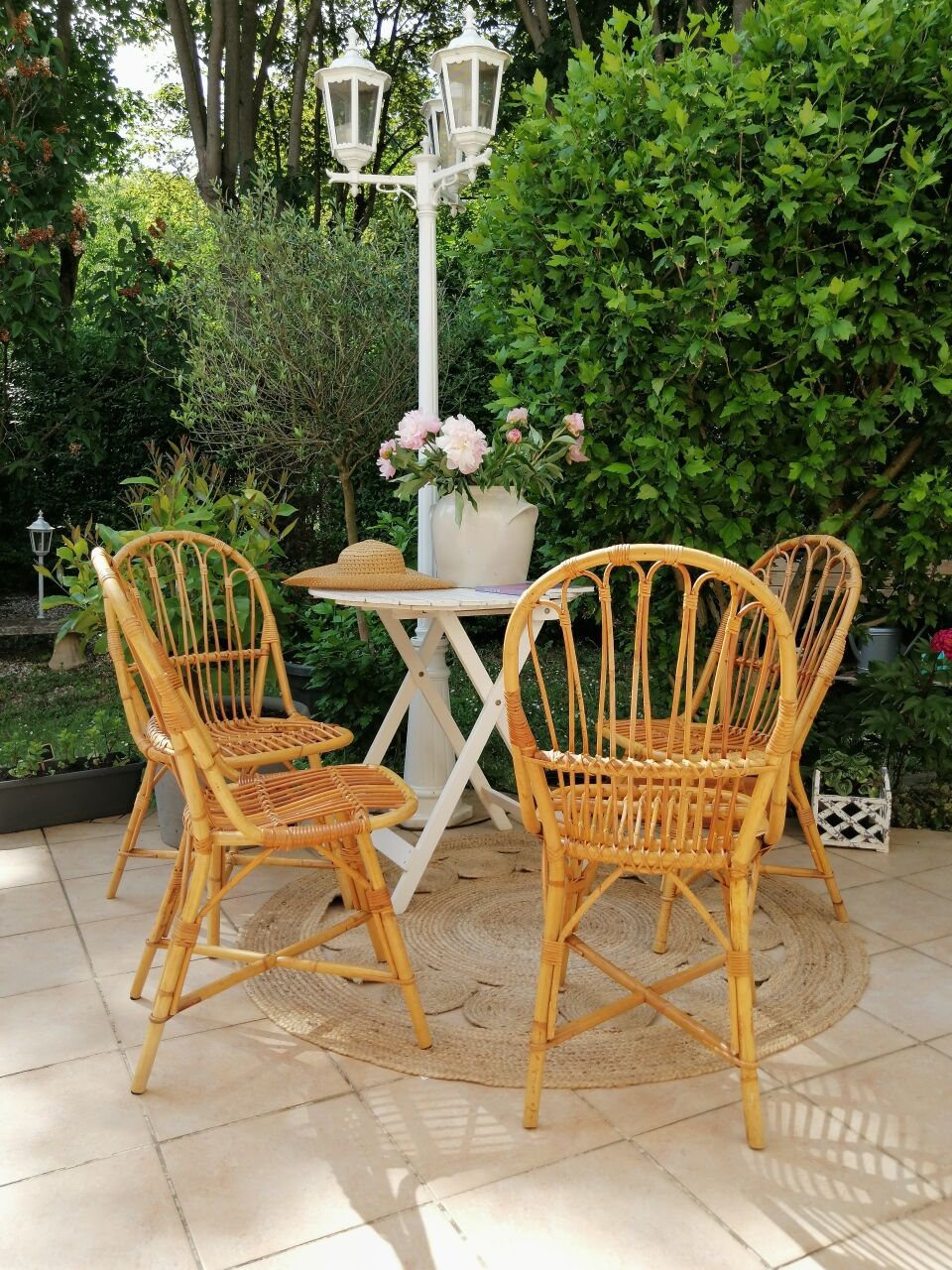 Series of 4 vintage rattan chairs.
