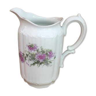 Old porcelain milk pot