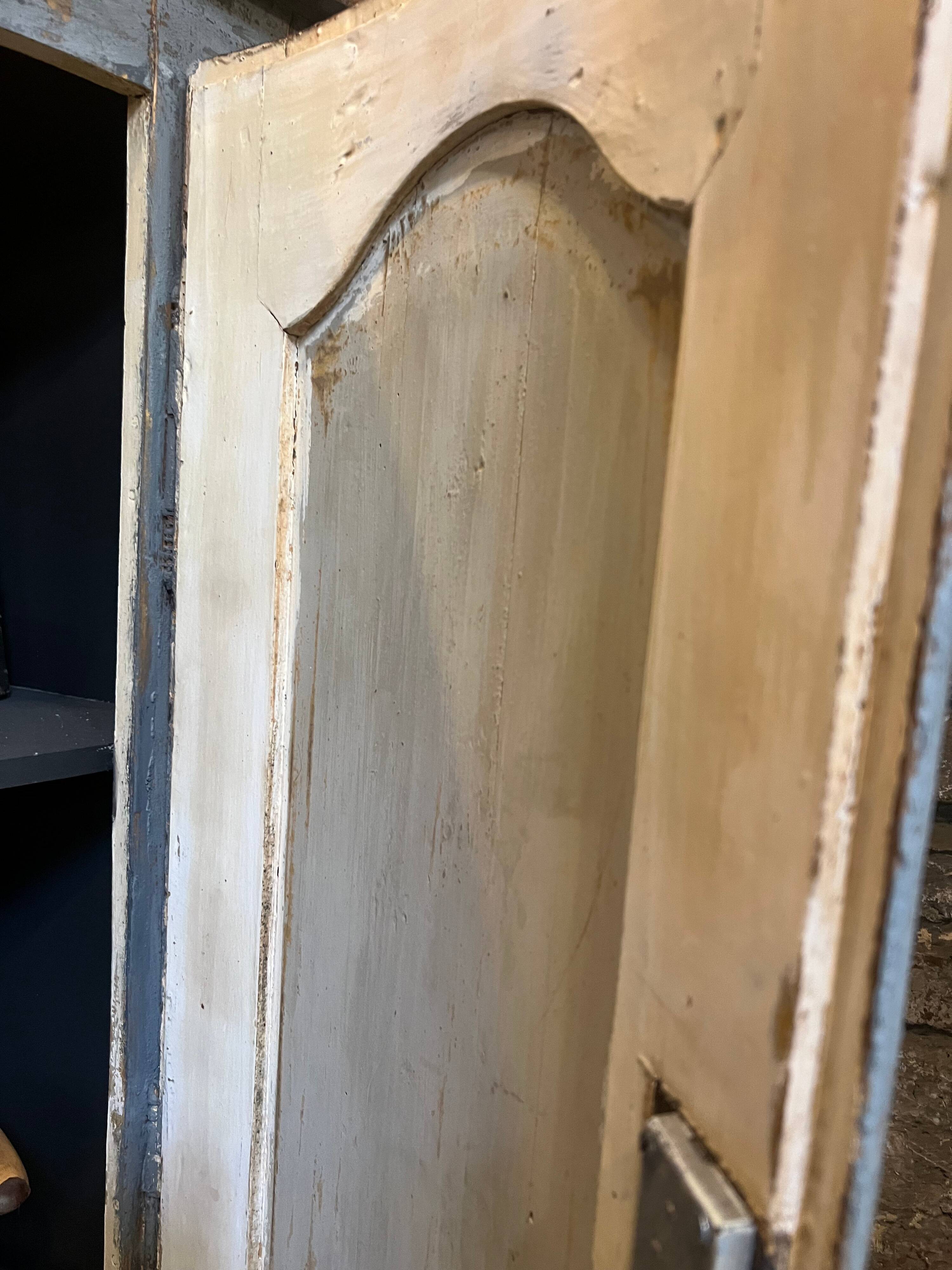Eighteenth-century corner cabinet with a patina.