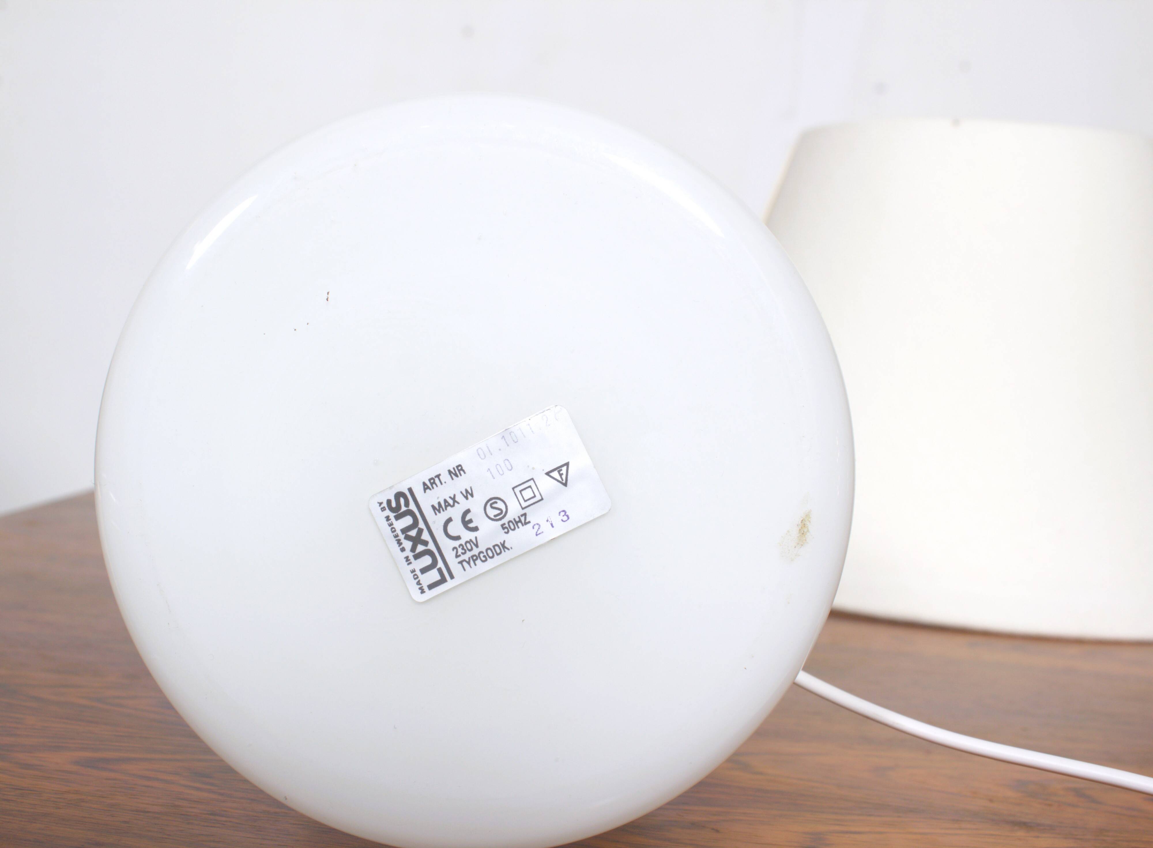 Pair of white glass lamps by Luxus Lighting, Sweden, 1980