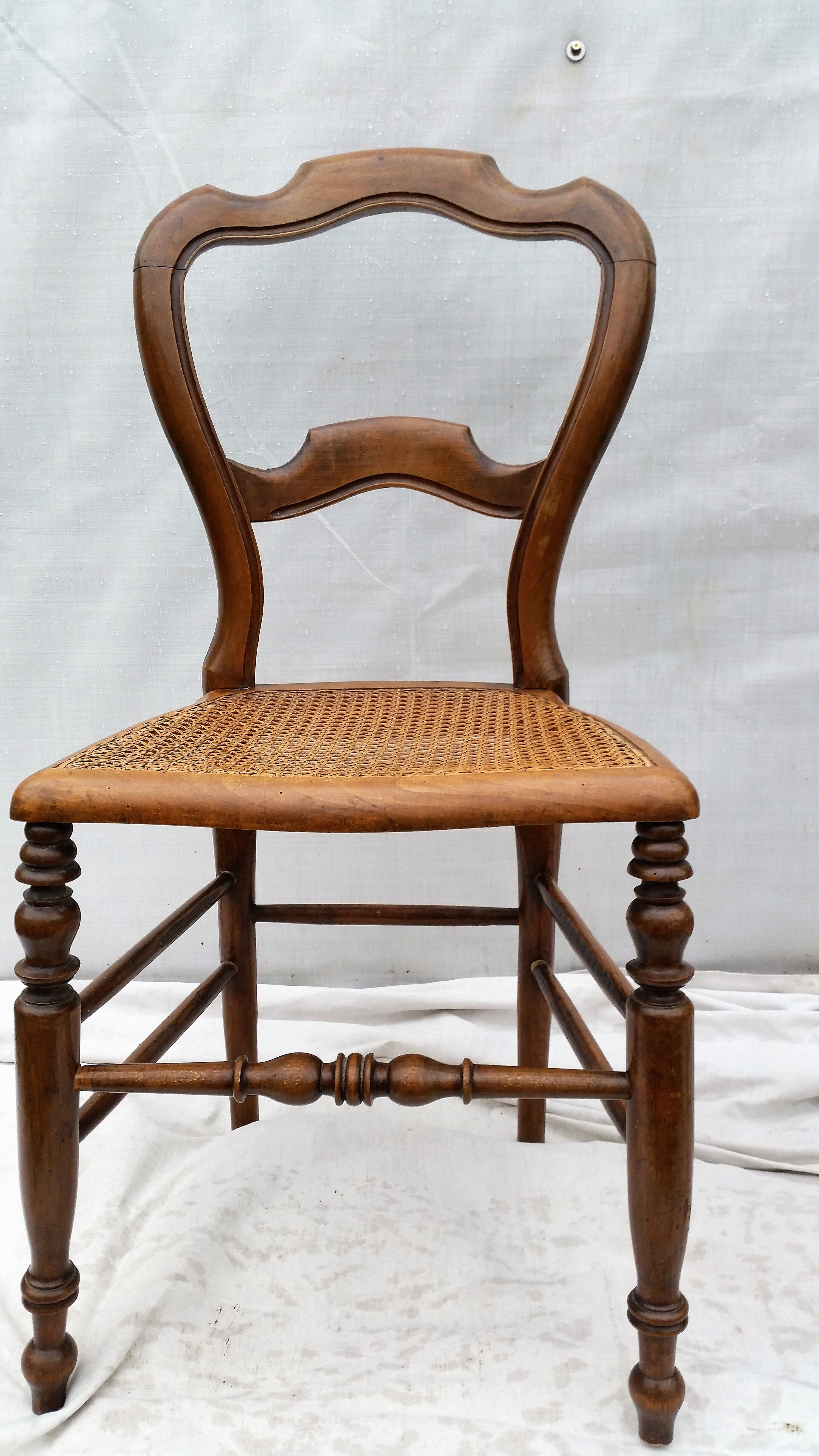 Pair of 2 old cane chairs