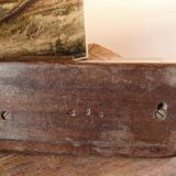 Pair of Art Deco carved wood candlesticks, signed Delaporte