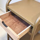 Old ochre metal bedside tables from a boarding school.
