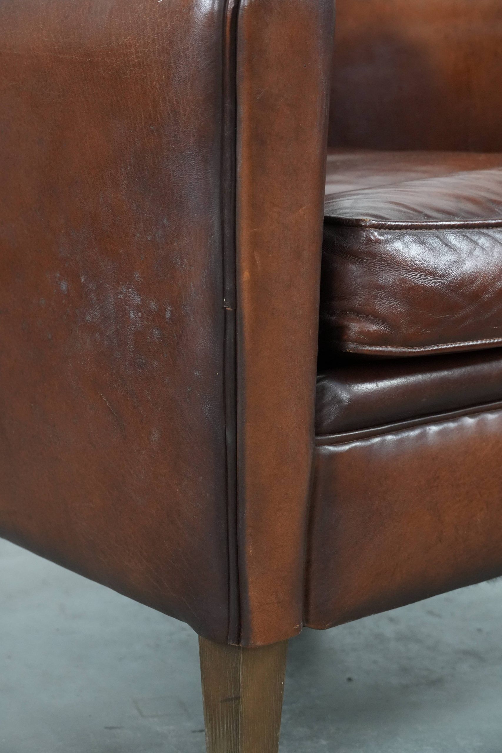 Armchair made of sheepskin leather in art deco design with warm colours