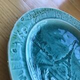 Cracked earthenware plate the Eiffel Tower