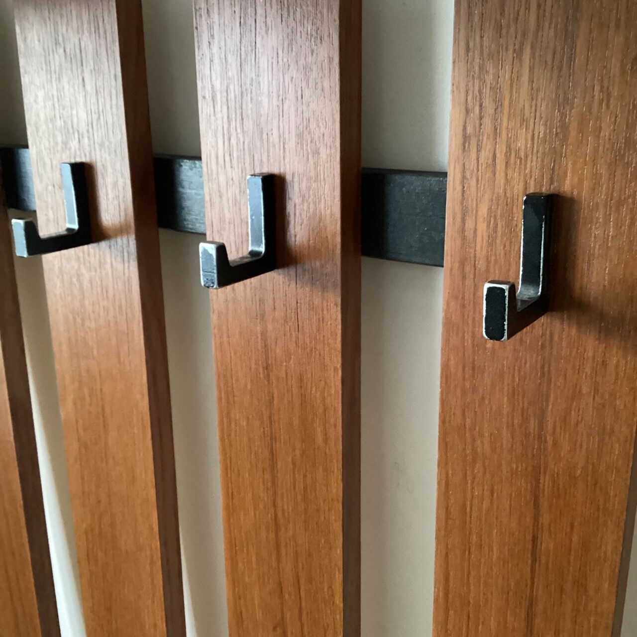 Wooden wall coat rack