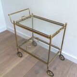 Neoclassical style rolling table in brass
