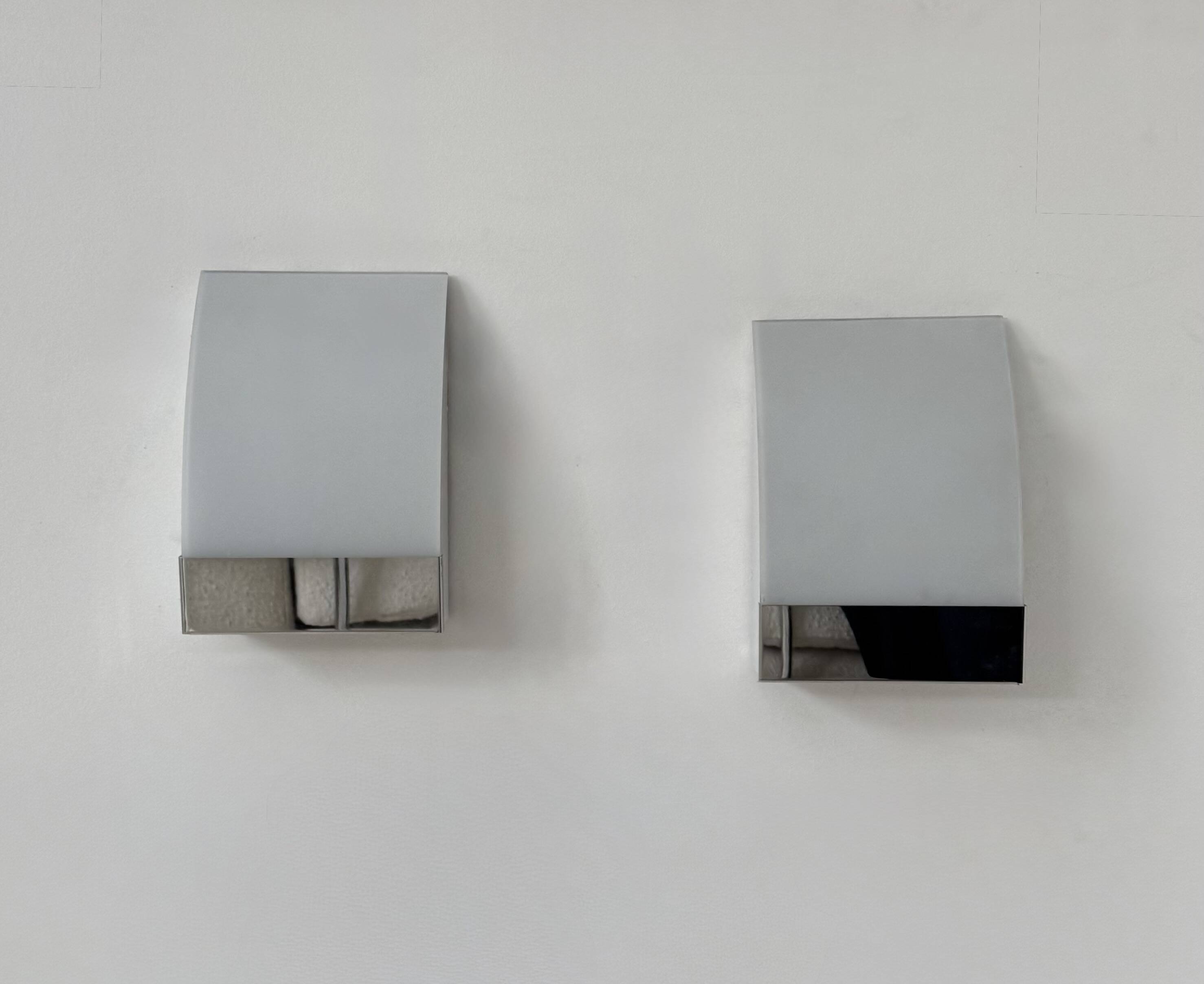 Pair of vintage wall lights, chrome-plated metal and frosted glass, France, 1980