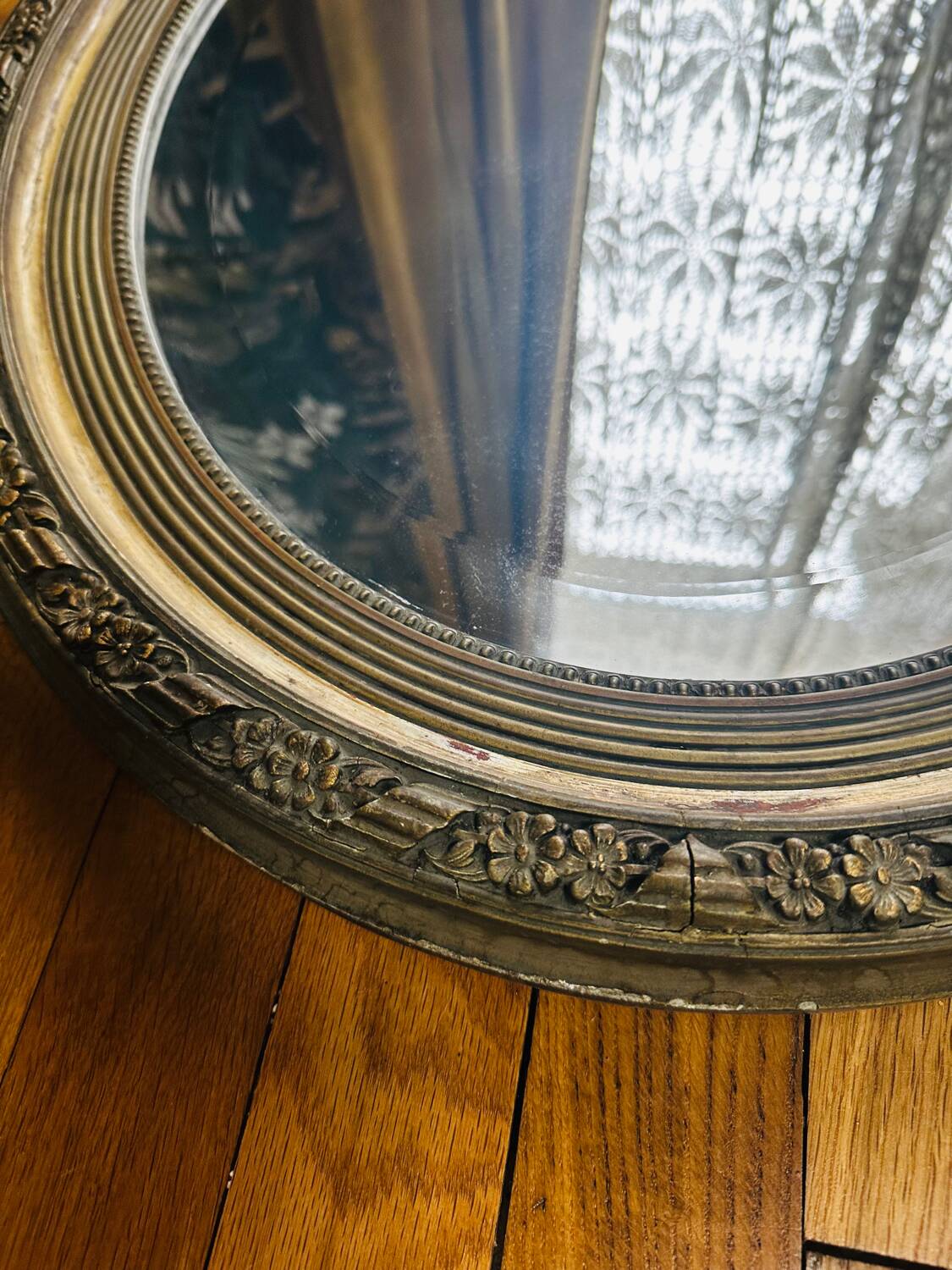 Large antique oval mirror