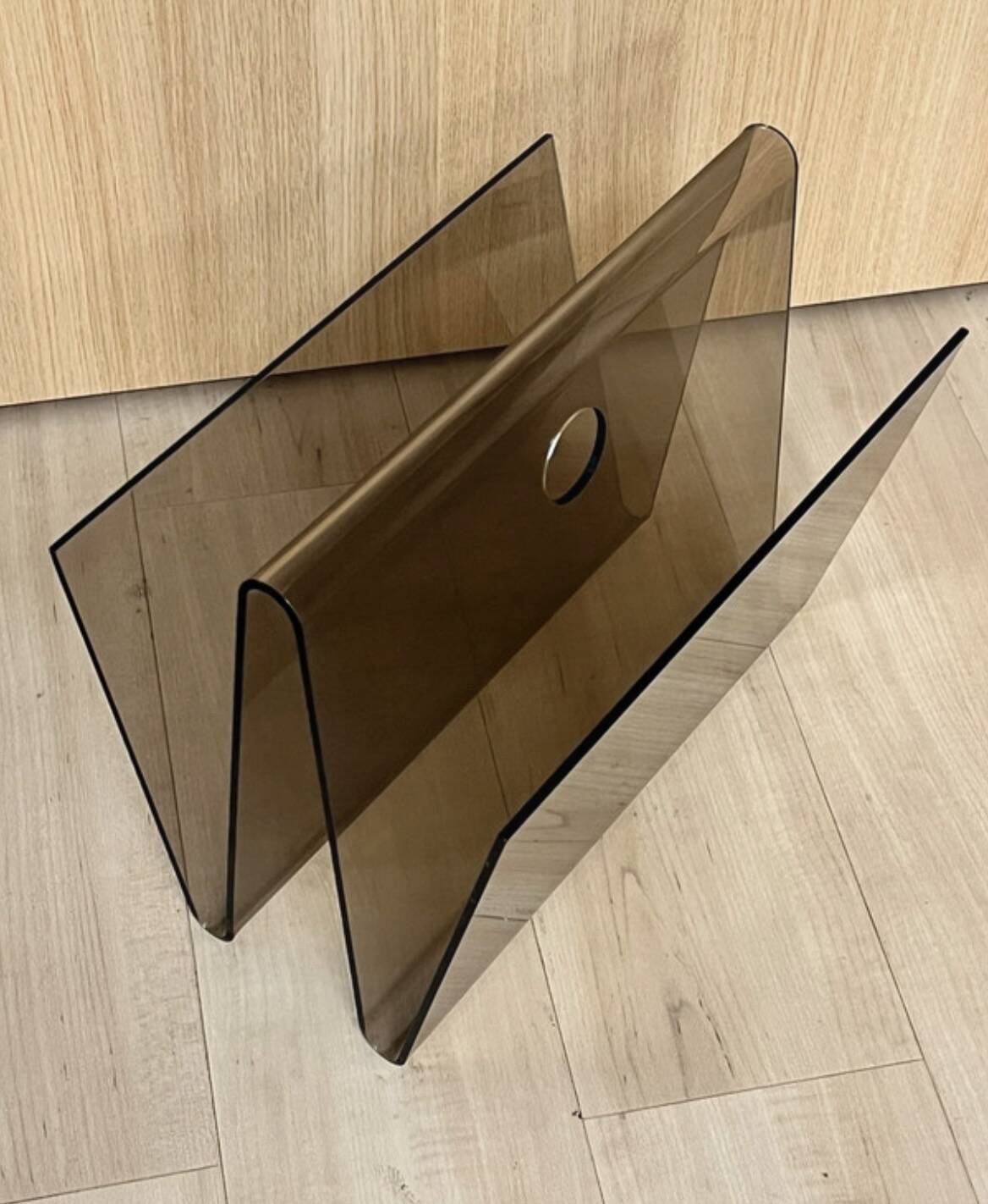 Smoked plexiglass magazine rack in the style of Michel Dumas, France, 1970s.