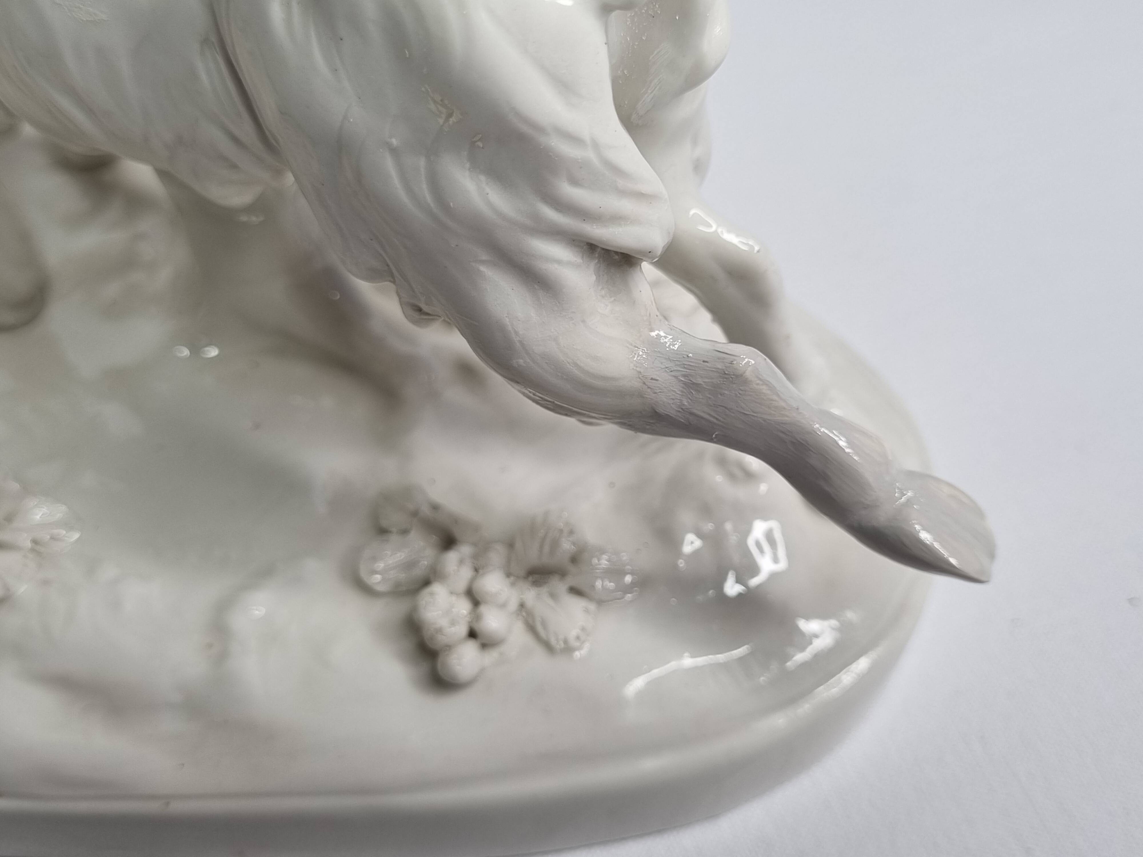 Saxon porcelain group, two fighting goats, signed Röhle, 1900