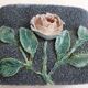Antique jardinière with rose design in barbotine pottery.