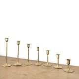 Set of 7 brass candlesticks