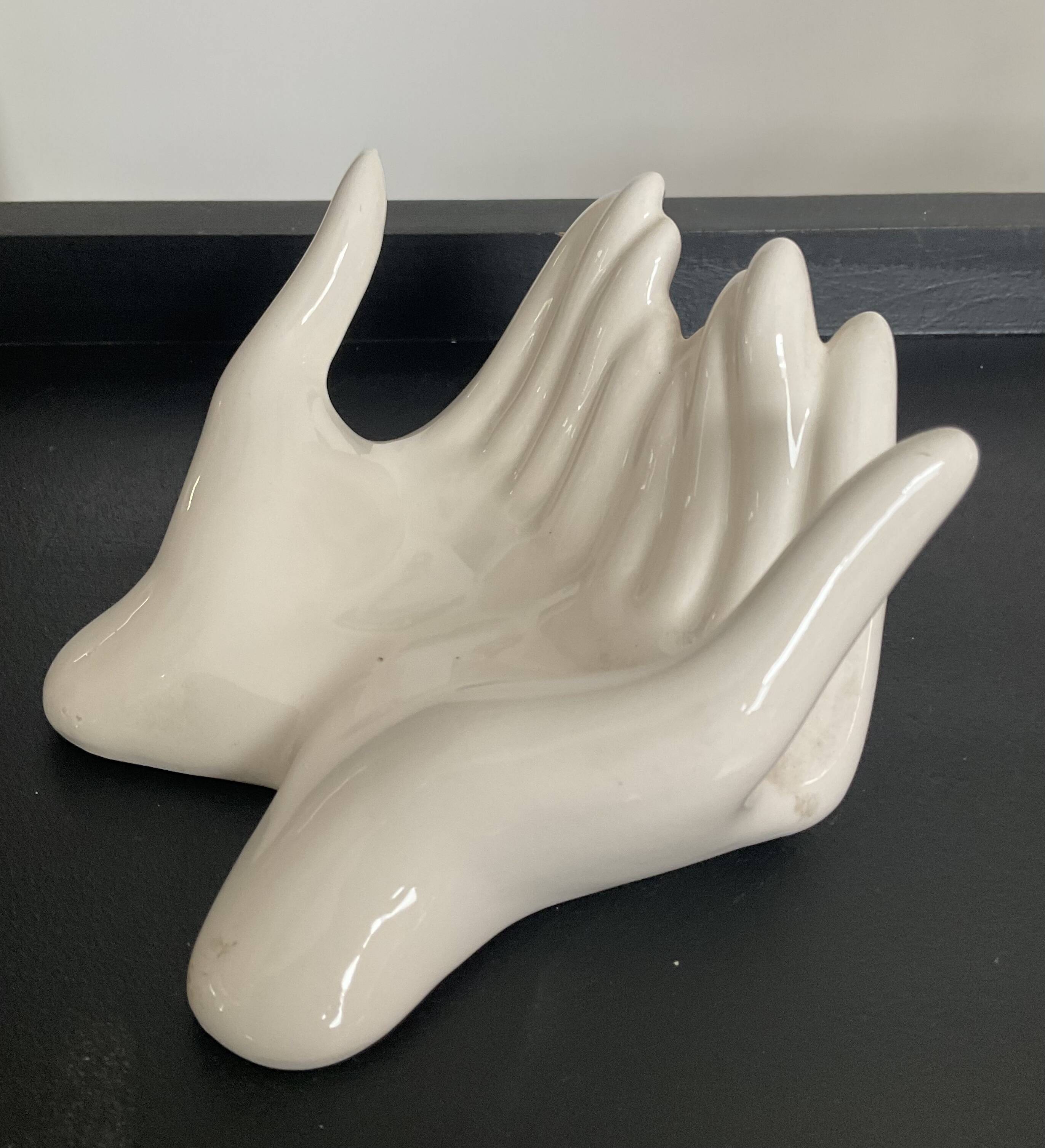 Empty pocket vintage ceramic hands