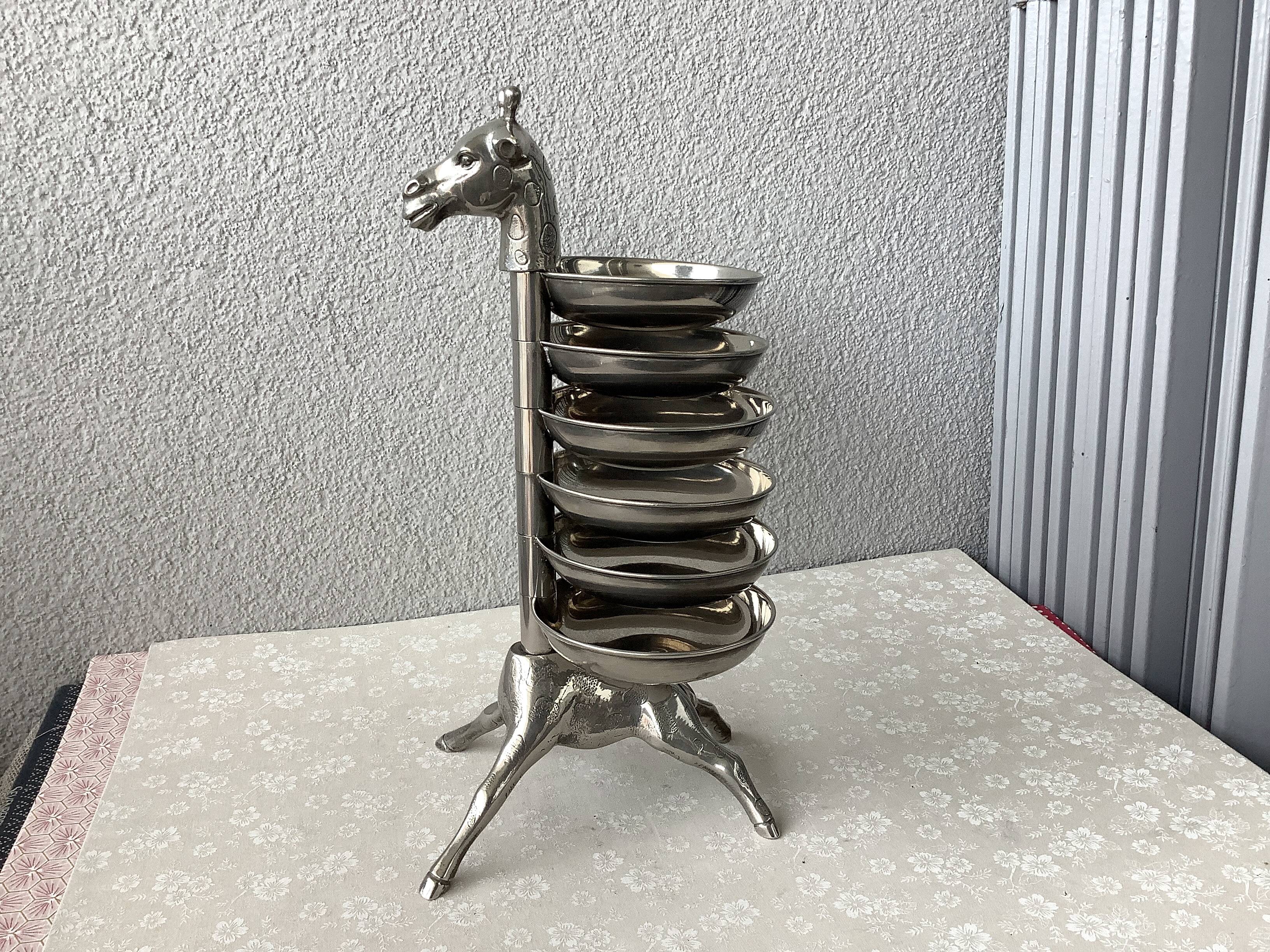 Bronze giraffe and silver metal servant