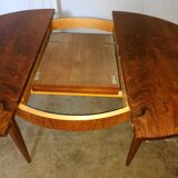 Table ronde en palissandre avec rallongedes années 70