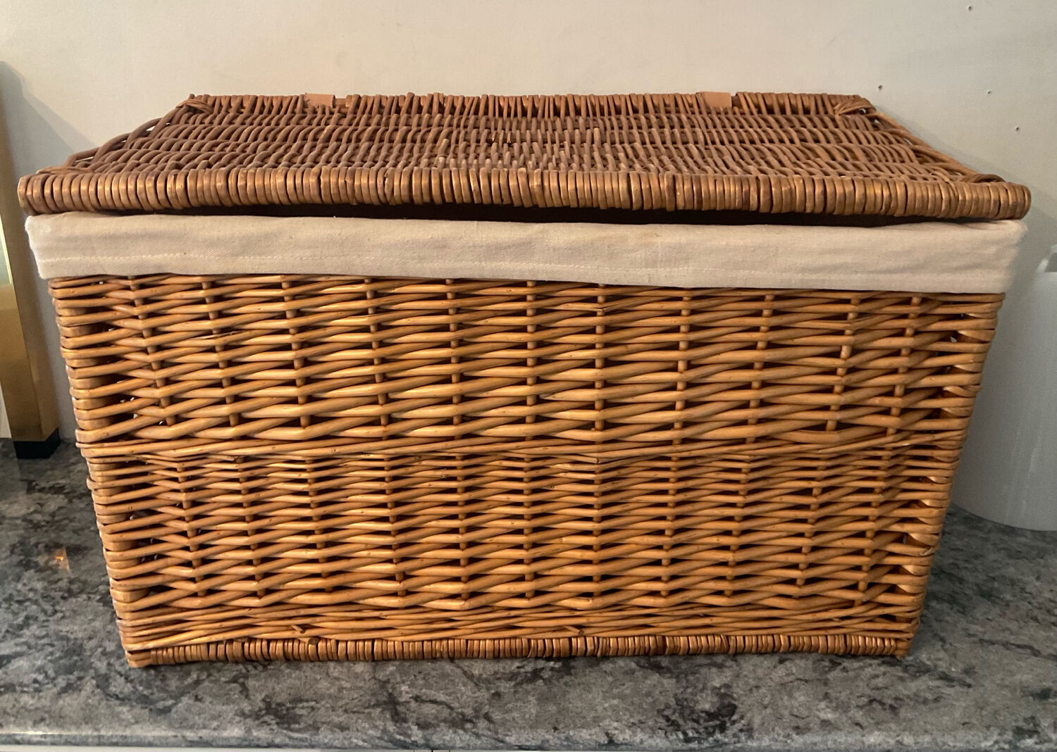 Woven wicker vintage suitcase