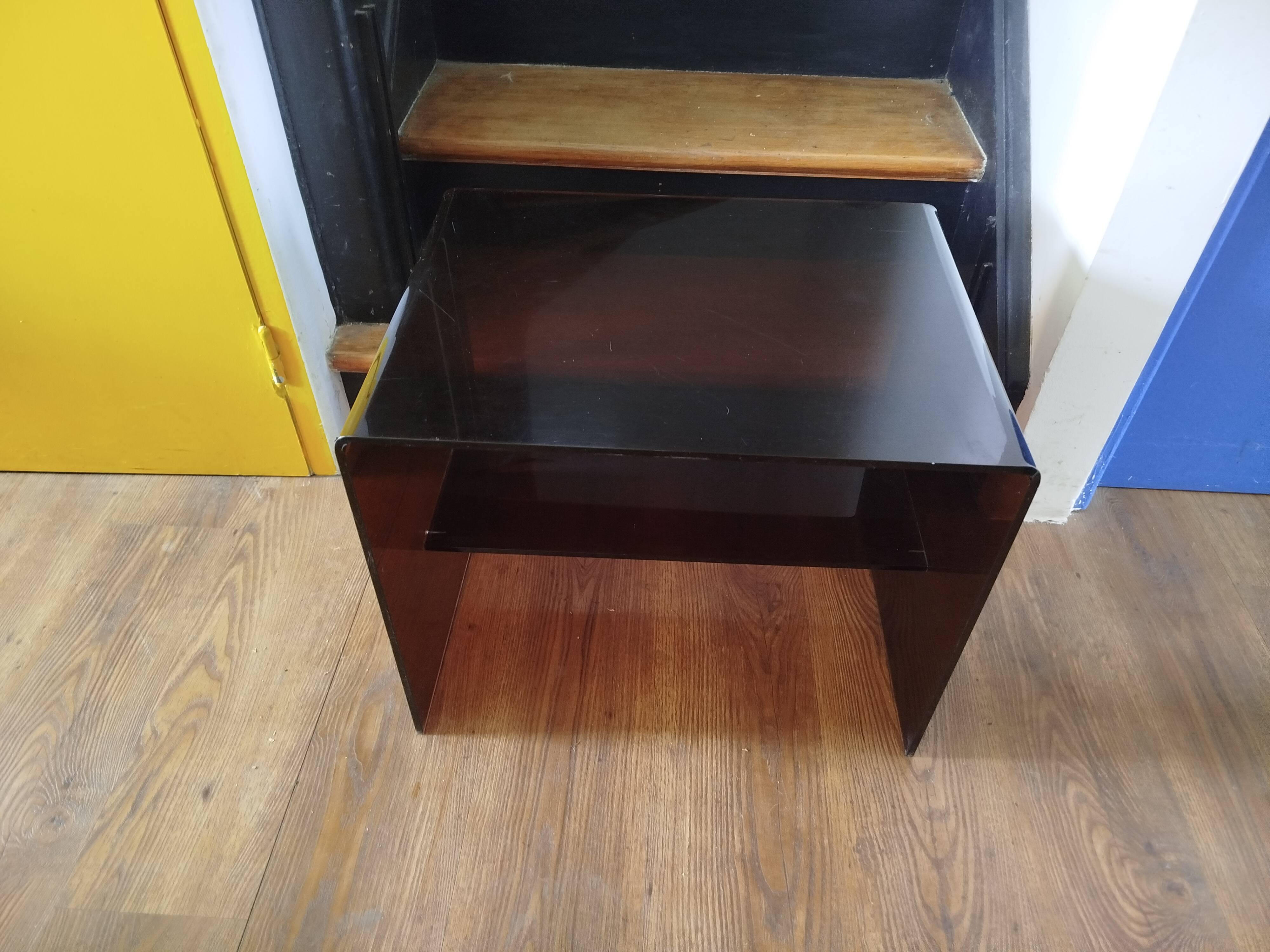 Coffee table / accent piece by Michel Dumas in smoked plexiglass – year